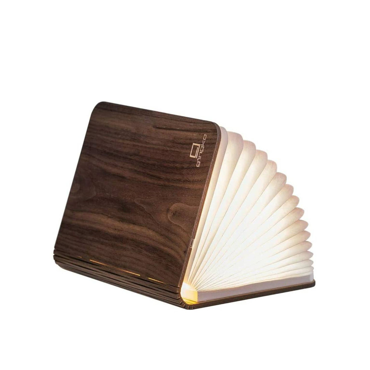The book light open like a book and lit, on a white background
